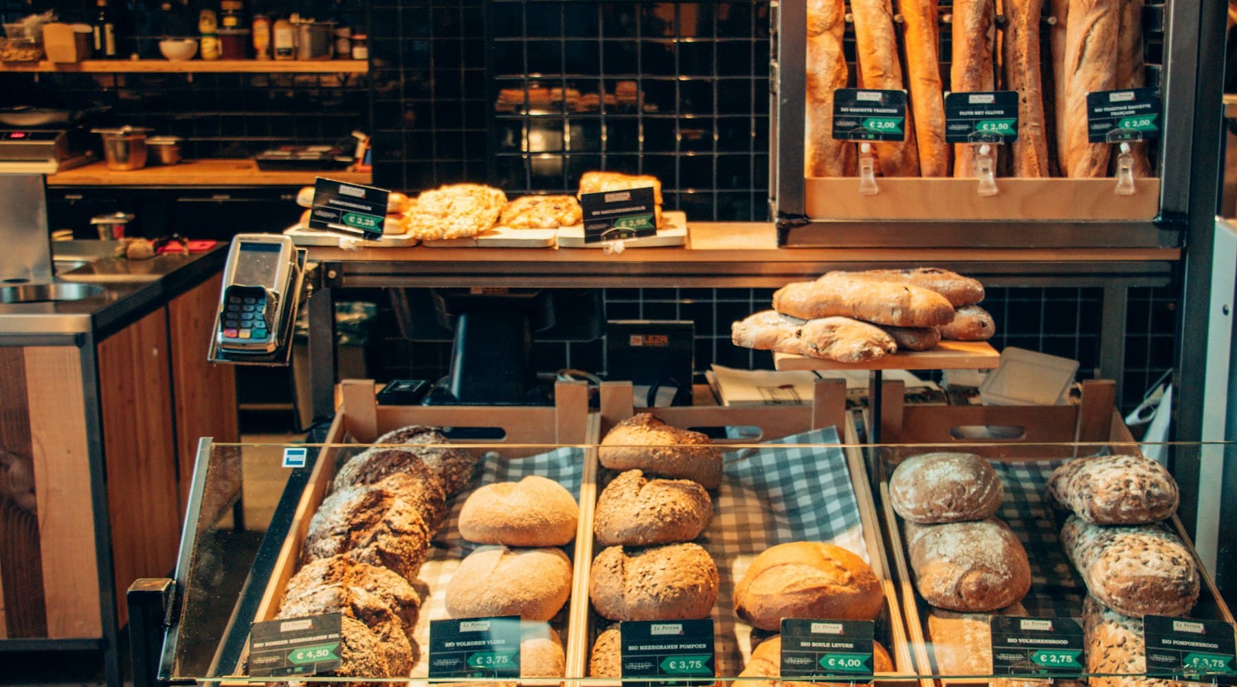 Display counter of fresh pastries and bakes at Sugar Bloom
